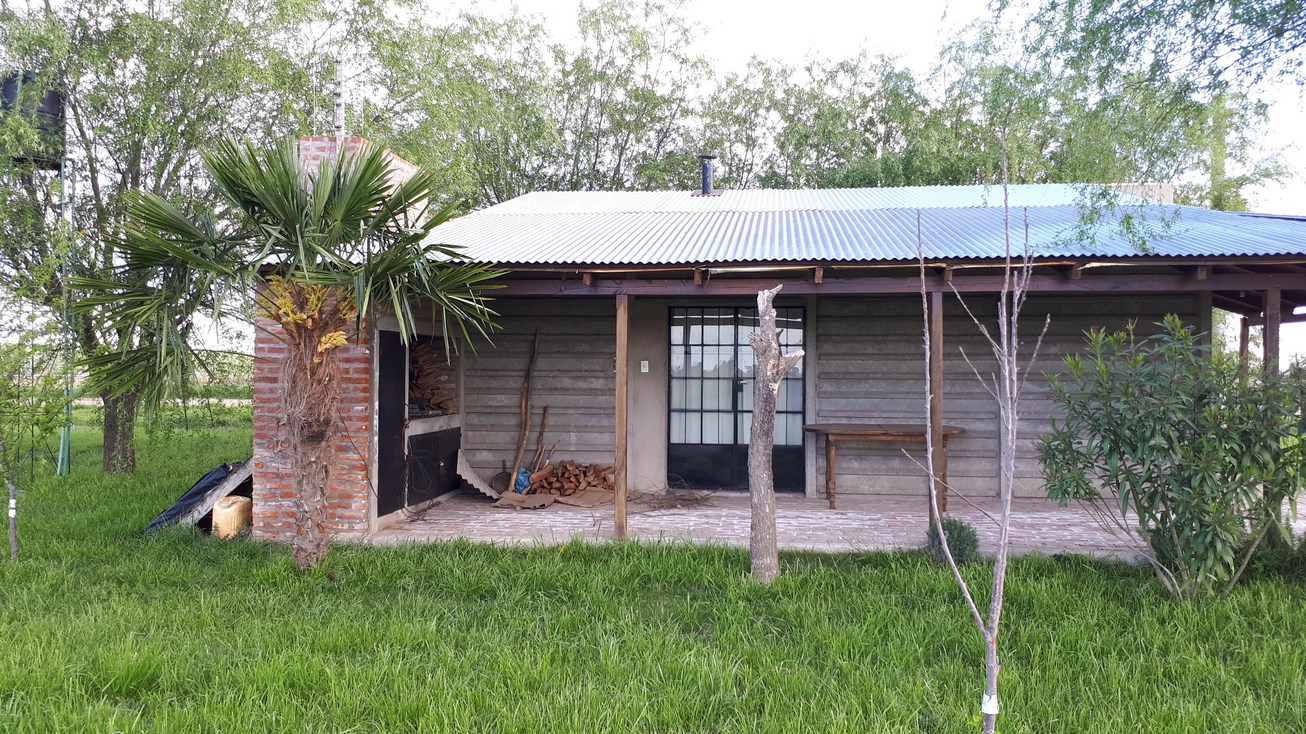 Chacra De 4,5 Has Con Casa, Luz, Parrilla, Galeria, Frutales, Salida A Dos Calles En Roque Perez, Para Empezar A Disfrutar Ya.